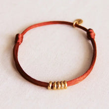  Bazou // Satinarmband Ringe Gold Cognac